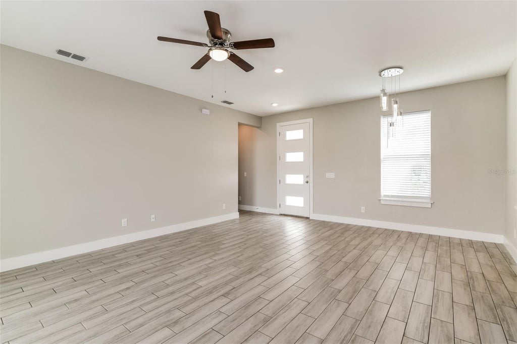 Photo of 325 Hibiscus Drive, Kissimmee, FL 34759 (MLS # TB8516042)
