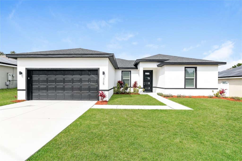 Photo of 325 Hibiscus Drive, Kissimmee, FL 34759 (MLS # TB8516042)
