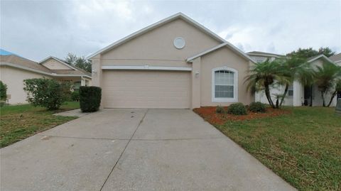 Photo of 2033 Whispering Trails Boulevard, Winter Haven, FL 33884 (MLS # O6336904)