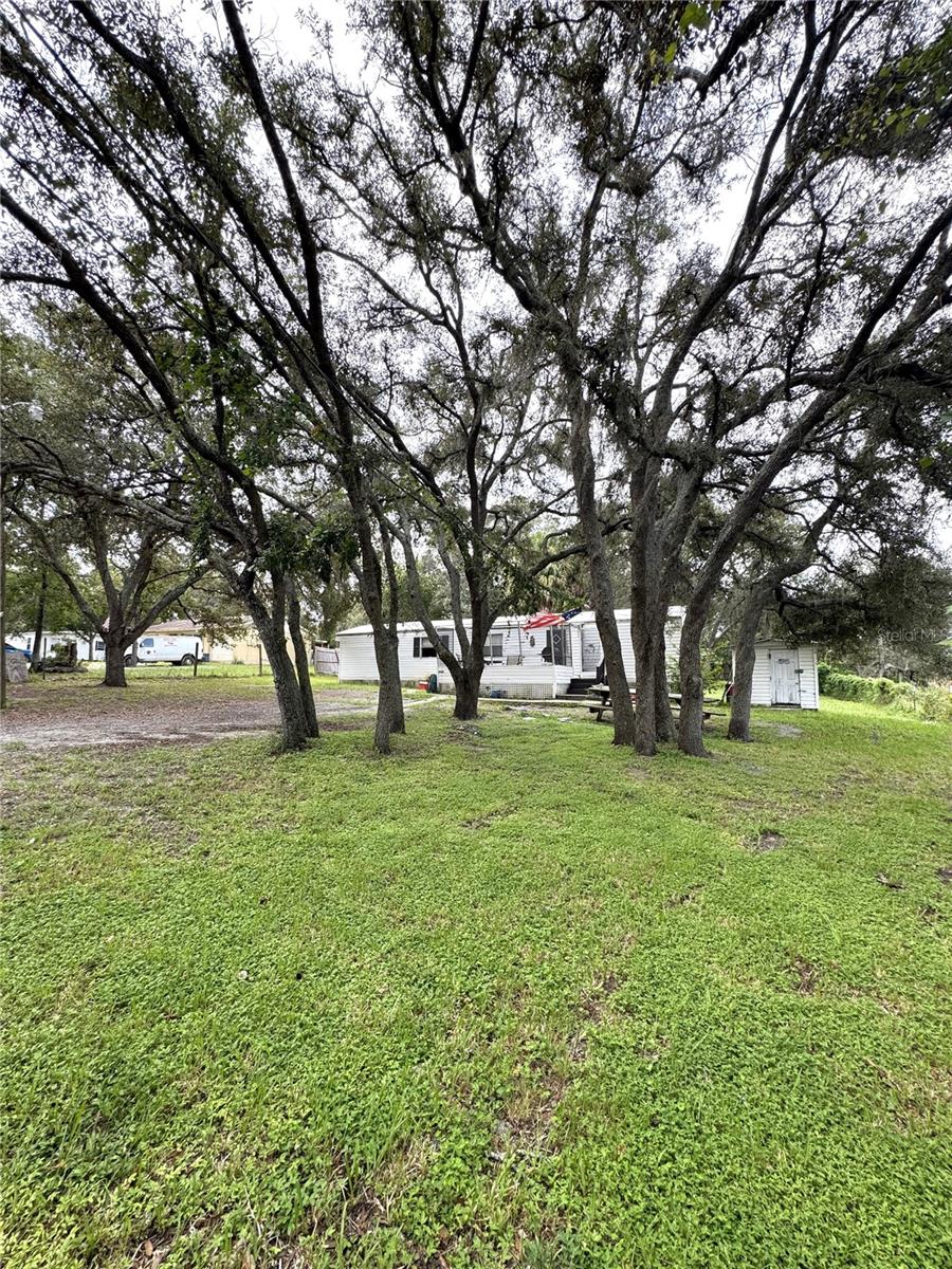 Charming 2-Bed, 2-Bath Manufactured Home on Spacious .45 Acre Lot! No HOA or CDD Fees No age restriction.You Own your Land.
This 2-bedroom, 2-bath manufactured home offers incredible potential on nearly half an acre, surrounded by beautiful mature trees and a fenced yard—perfect for pets, gardening, or future upgrades. Located just minutes from shopping, dining, entertainment, medical facilities, and Florida’s beautiful Gulf Coast beaches!Step inside to an open-concept layout with a spacious living area, inside laundry room, and a cozy front porch ideal for relaxing mornings or evening breezes. The property needs a little TLC, but with some updates, it could shine as a great primary residence, seasonal getaway, or rental investment.Don’t miss this opportunity to create your dream home in a fantastic location with plenty of space to grow!
________________________________________
