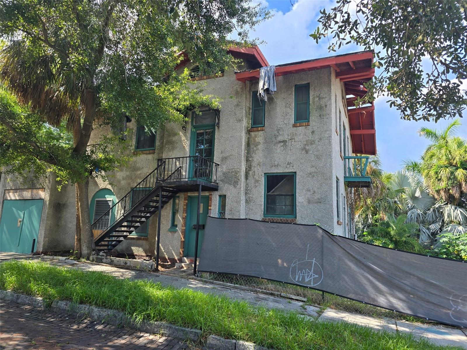 Exceptional Rehab Opportunity in Historic Roser Park!!!
One of Roser Park’s most iconic properties is now available—offering unmatched potential to become the crown jewel of this historic neighborhood. Perched on what is likely the highest elevation in the city, this home boasts panoramic views of scenic Booker Creek.
A brand-new custom barrel tile roof is scheduled for installation in 2025, providing a solid foundation for your vision. The home features stucco over clay block construction and strong bones, making it ideal for a full-scale renovation (NEEDS: Electric, plumbing, HVAC, drywall, kitchen, baths, flooring).
This is your chance to restore and reimagine a legacy property in one of St. Pete’s most coveted and storied neighborhoods. Please do not enter the property without an appointment. Schedule your private tour today and explore the possibilities!