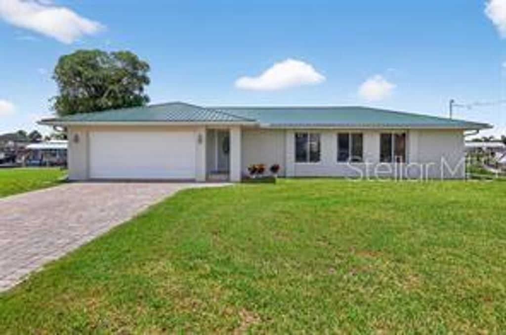 Photo of 24277 Treasure Island Boulevard, Punta Gorda, FL 33955 (MLS # O6376226)