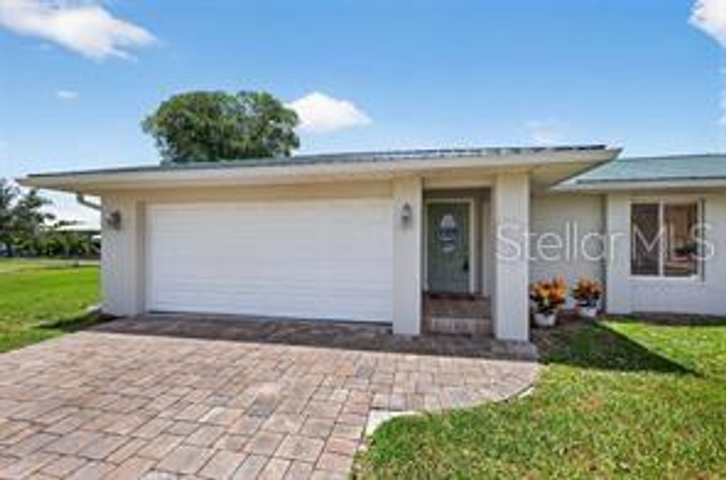 Photo of 24277 Treasure Island Boulevard, Punta Gorda, FL 33955 (MLS # O6376226)