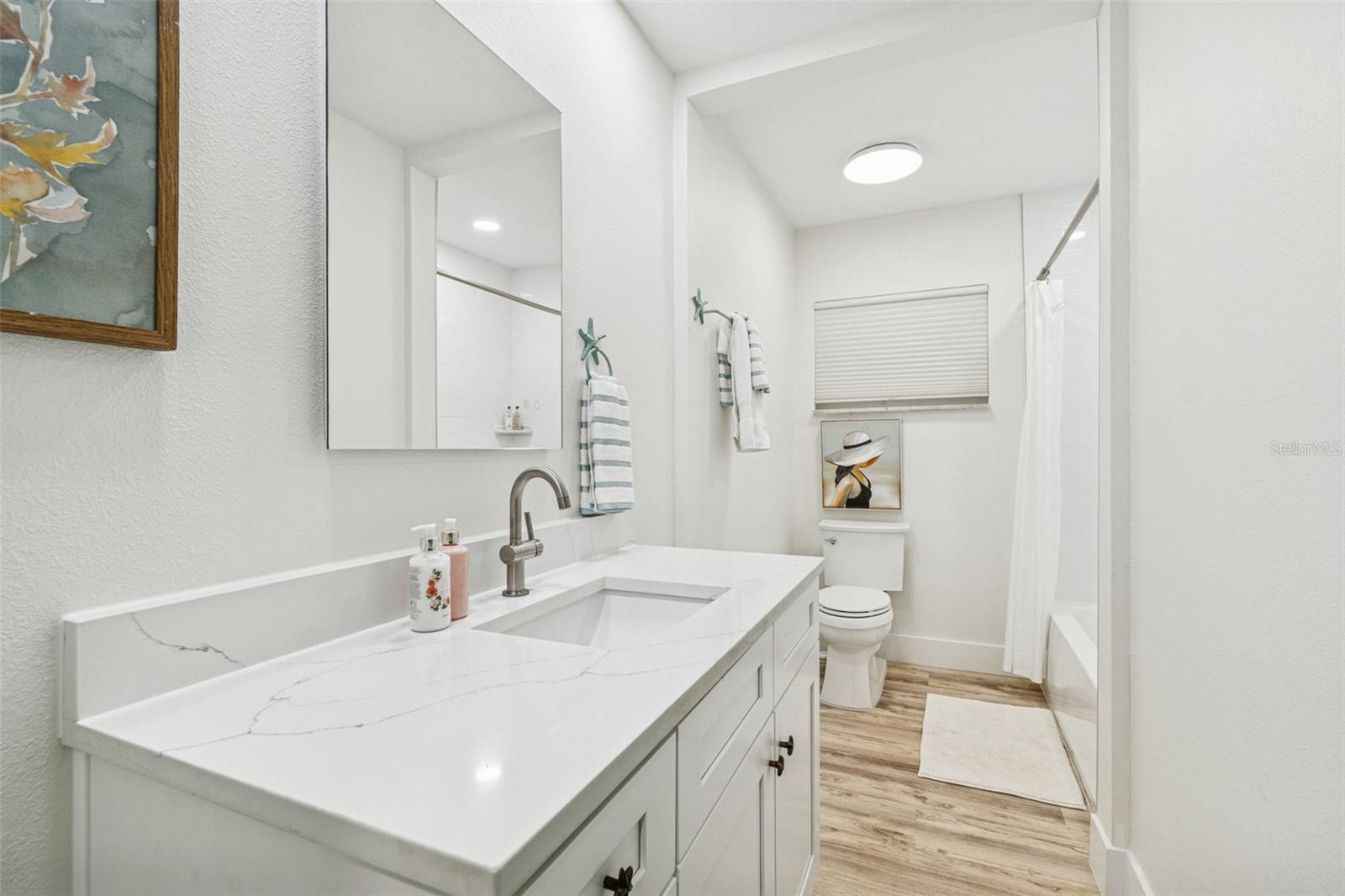 SUN-LIT SHORES - Residential