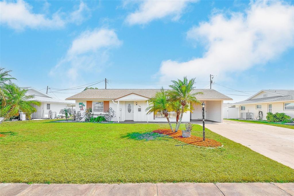 Photo of 708 Tam O Shanter Avenue, Sun City Center, FL 33573 (MLS # TB8479028)