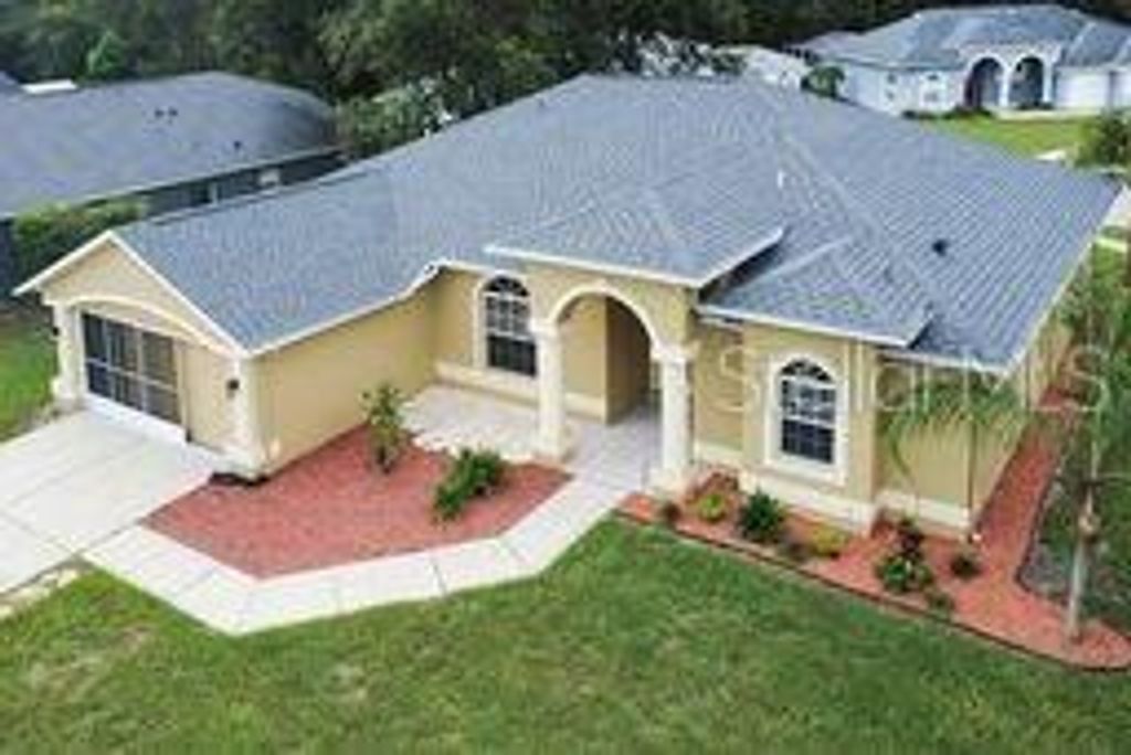 Photo of 13636 Knotty Lane, Hudson, FL 34669 (MLS # TB8425551)