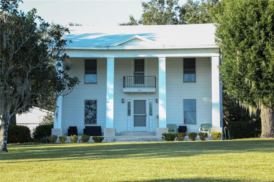 Charming lakeside home on beautiful Lake Ariana in Auburndale. This property offers peaceful water views and a spacious lot with a detached garage and screened in patio. The home features comfortable living areas, a functional kitchen, and plenty of natural light throughout. Built in 1910, this home features red pine wood flooring, and other features unique to a historic home. Enjoy mornings by the lake or relaxing evenings on the property’s quiet street, just minutes from downtown Auburndale, schools, and easy access to I-4 for travel to Tampa or Orlando. Perfect for anyone looking for lakefront living with small-town charm.