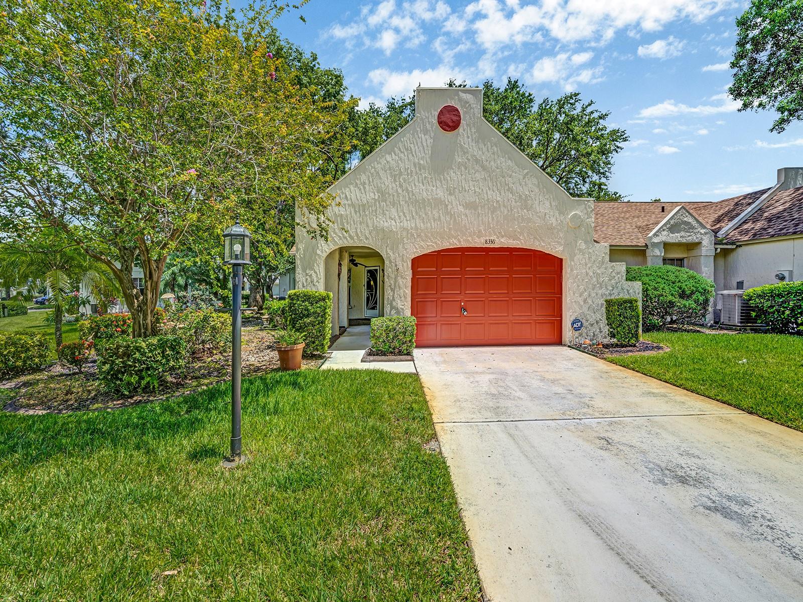 BACK ON MARKET, Passed Inspections! Welcome Home to this beautifully maintained 2-bedroom, 2-bath end-unit villa in the vibrant 55+ community of Capri Village at Timber Oaks. This move-in ready residence features a bright, open-concept layout with a spacious living and dining area, a well-appointed eat-in kitchen, and a generous master suite with it's own mini-split AC unit for extra comfort, complete with a walk-in closet and private en-suite bathroom with walk-in shower. The home includes an oversized 1-car garage with ample storage, along with both front and rear patios—ideal for relaxing or entertaining. Outside, you'll love the beautifully landscaped surroundings and the rare, grandfathered-in garden, offering a unique and private touch of nature that sets this villa apart. Recent updates bring added peace of mind, including a new roof (2021), new AC system (2021) with a recent tune-up, a newer dishwasher and brand new refrigerator, new flooring in the guest bedroom, and a never-used walk-in tub in the guest bathroom. The HOA takes care of the essentials, covering WiFi and cable, water, exterior maintenance, exterior pest control, and roof upkeep, allowing you to enjoy a truly low-maintenance lifestyle. Residents also enjoy access to the Timber Oaks clubhouse, offering a heated pool and spa, tennis courts, billiards, and more. Located in a no-flood zone and just minutes from shopping, restaurants, medical facilities, and beaches. This villa delivers the perfect blend of comfort, convenience, and carefree Florida living.