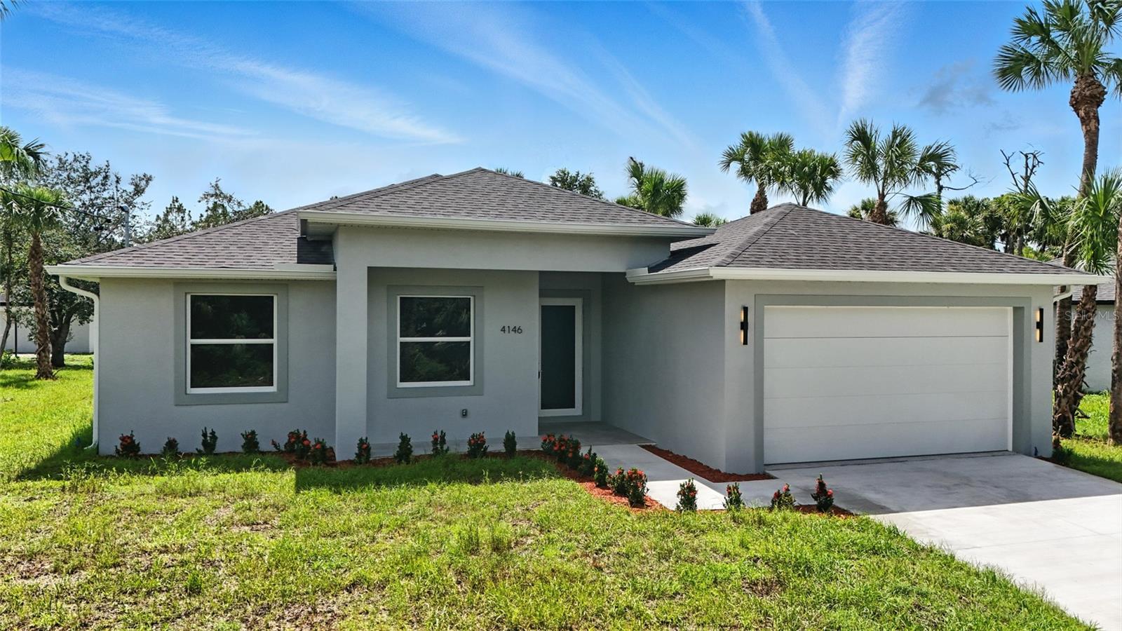 Under Construction. MOVE IN READY - new construction! Minor final details are being completed by 6/25/25. **Builder is offering $5,000 in closing cost assistance** — don’t miss this opportunity. There are 2 properties built next to each other.
This home features a spacious covered lanai, smooth modern wall textures, and soaring 9'4" ceilings that enhance the open concept layout. Custom closet systems installed. High-end finishes include quartz backsplash, LED recessed lighting, and porcelain tile in both the entrance and lanai areas. Irrigation system and water softener included for added value and convenience.
Introducing the "Providencia" model — a true gem in the heart of North Port, crafted with impeccable attention to detail by the distinguished design team at Investors 180 Group. Every element of this home has been thoughtfully curated to stand out from typical new construction in the area, offering a unique blend of luxury, functionality, and modern aesthetics.
This residence showcases high-end finishes, including high roofs 9'4", which adds to the home’s spacious and upscale design, elegant quartz countertops, solid 3/4" plywood white shaker cabinetry, expansive 24x48 porcelain tile flooring, and impact-resistant white aluminum/glass windows.
The gourmet kitchen comes fully equipped with a range, refrigerator, dishwasher, and microwave, seamlessly complementing the open-concept design. Designed for everyday enjoyment and special gatherings, the home features a huge covered lanai of 280 sq ft with luxury tile floors— perfect for relaxing outdoor living and memorable family moments. Embrace the serene and vibrant Florida lifestyle with this new construction located in a flourishing area of North Port, known for its rapid growth, natural beauty, and unmatched quality of life. No HOA, no CDD.
Discover elevated living — YOU ARE GOING TO FALL IN LOVE - SCHEDULE YOUR PRIVATE TOUR TODAY.
Additional identical model available next door.
