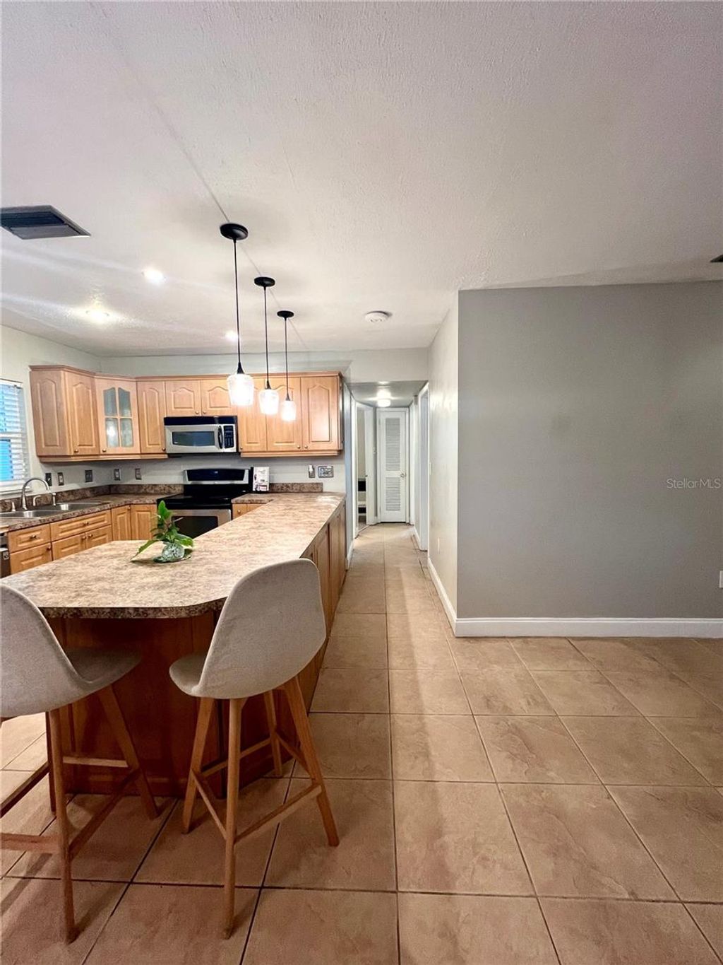 Photo of 2908 W Heiter Street, Tampa, FL 33607 (MLS # TB8463422)