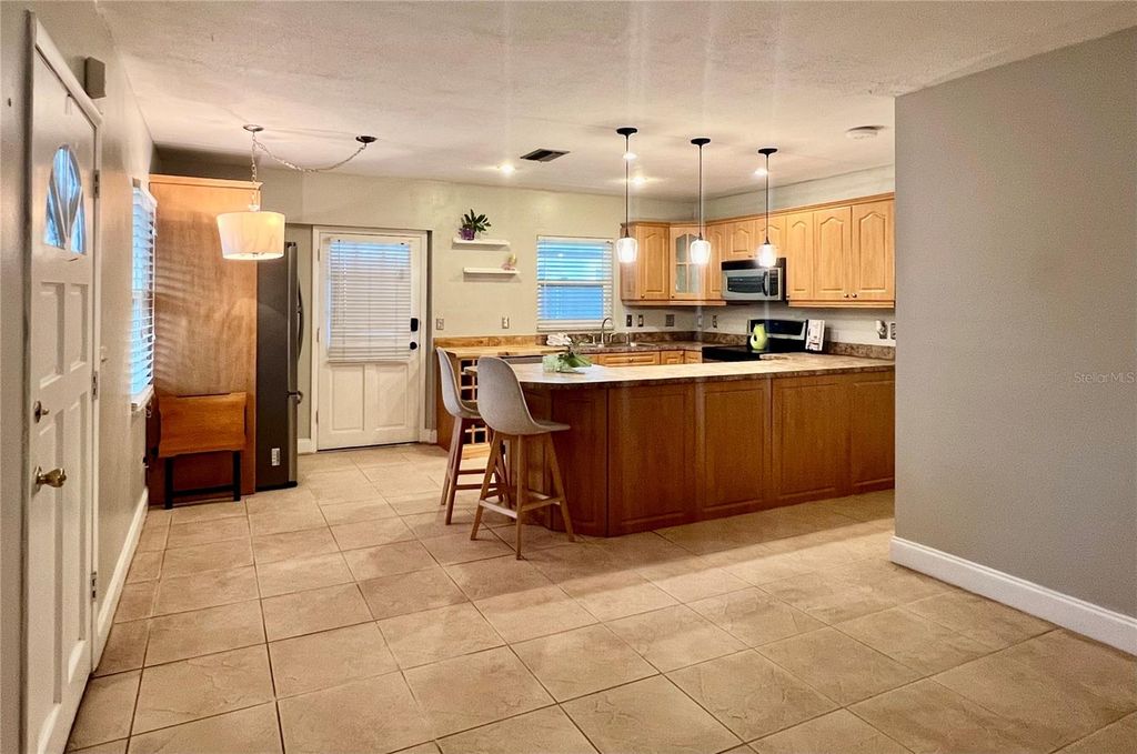 Photo of 2908 W Heiter Street, Tampa, FL 33607 (MLS # TB8463422)