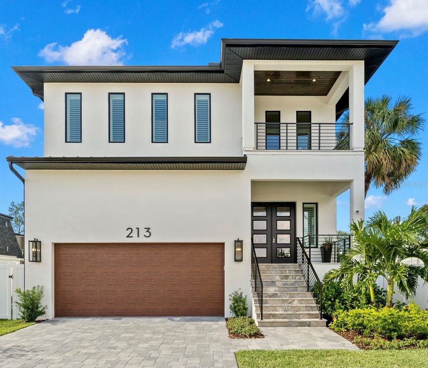 Under Construction. Almost completed.  Experience the luxury and quality of this 2024 NEW CONSTRUCTION elegant home perfectly situated in heart of South Tampa’s beautiful Beach Park neighborhood.  
Thoughtfully designed with livability in mind, this stunning home has 4 bedrooms, 4 and 1/2 baths plus a bonus/game room and a private study.  4719 sq ft. Featuring many amazing luxury finishes throughout.  Beautiful wood work and crown moldings along with wide plank engineered wood flooring throughout,  smooth drywall,  10 foot ceilings, designer lighting and 8’ tall solid wood doors illustrate incredible attention to quality and detail.  
As you enter the house the impressive double doors and soaring 22 foot high foyer welcome you to this stunning residence.  Continuing into the heart of the home, the OPEN CONCEPT Living Room, Kitchen and Dining area all work together seamlessly.  You will enjoy the extraordinary and spacious gourmet chef's kitchen with stainless steel appliances, custom cabinets with loads of space, an oversized island, quartz countertops, under cabinet lighting and a generously sized butler’s pantry.  The expansive great room with built in bar and feature wall with linear fireplace. The main floor also boasts a grand office, and a guest suite and bath with private access to backyard lanai, and a mudroom.
The wall of Pocket sliding glass doors opens up and incorporates  your private retreat featuring a resort like pool/spa and outdoor kitchen area great for entertaining. If outdoor living is your way of life, then this home will not disappoint.  This amazing backyard oasis features an expansive covered lanai with travertine floors.  Abundant lounging and sunning where the entire family can rest, rejuvenate, play and come together.
Upstairs you will find the owner’s suite,  with walk-in custom designed closet and a spa inspired bathroom with floor to ceiling tile, free standing tub and dual sinks.  A large bonus loft with wet bar, a fabulous front terrace and a  generous laundry room complete this level’s floor plan.Full security system. Electronics closet allowing for hidden wireless entertainment system. Pre-wired for surround sound. Soft close cabinet doors and drawers. 2 tankless gas water heaters for endless hot water.  Tropical landscaping and new fencing to enjoy the back yard for entertaining.  Energy efficient Low-E impact glass windows. 10 yr structural warranty.   Buyer must use Seller approved contract for offers. Designed to surpass your expectations of quality, styling and craftsmanship.