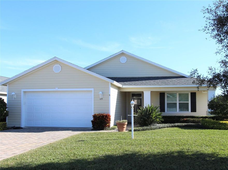 LAKEFRONT - Gorgeous two-bedroom, two bath concrete block home is nestled on a beautiful, landscaped lot and overlooks the largest lake/pond in the community. This spacious home features an open floor plan and is great for entertaining or just visiting with family and friends. The kitchen features Whirlpool stainless steel appliances, wood cabinets with soft close doors and drawers, granite countertop and a huge island. Other features include vaulted ceilings, crown molding, upgraded tile plank flooring in the main living areas, upgraded PGT windows, interior shutters, foam insulation in the block walls, an oversized garage and pavered front porch and drive. The master suite is fit for queen and king and the master bath features double sinks, granite countertops and a zero-entry shower. Enjoy your morning coffee while watching the beautiful sunrise and abundant wildlife from your screened patio. The home was constructed in 2017. All measurements approximate. Not a lot rental community, own your own land. Lighthouse Cove is a beautiful  riverside community with a large heated swimming pool, club house, tennis and pickle ball courts, shuffleboard courts, boat launch for shallow water boats, recreational picnic area on the river and a fishing pier. Lighthouse Cove has weekly events at the club house (PRE-COVID). Golf carts are a second means of transportation. It is a boating/fishing paradise. Don't miss out. A great opportunity to live in paradise!!! This home will not last long. ;Water: City