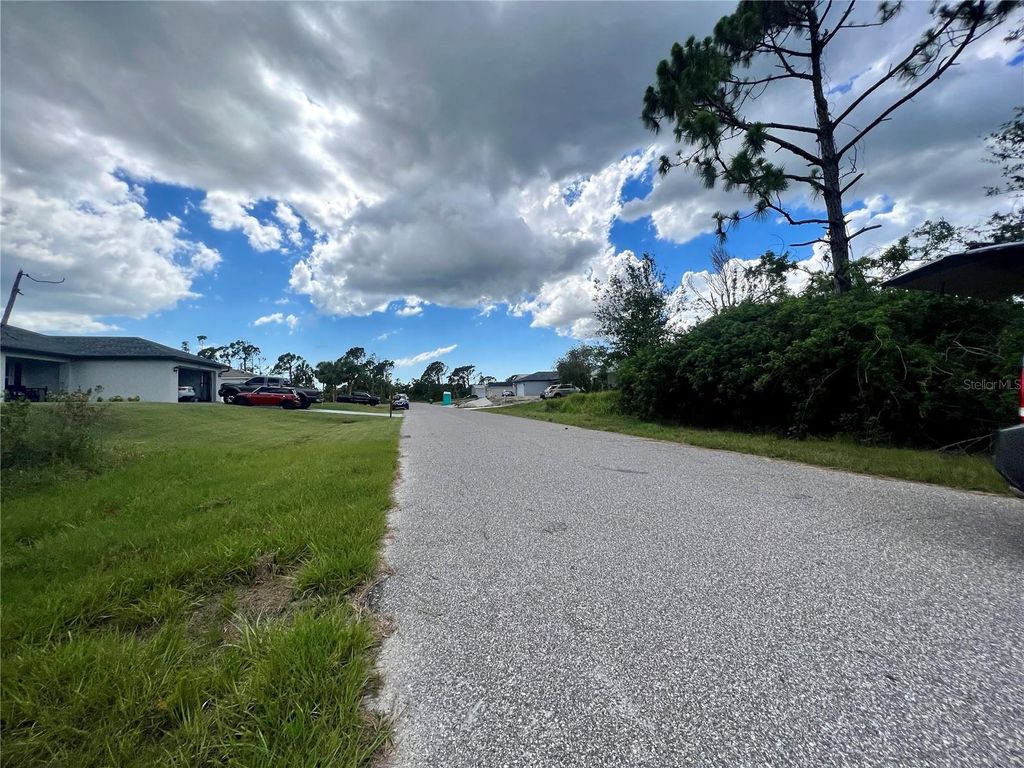 Photo of 12095 Warden Avenue, Port Charlotte, FL 33981 (MLS # C7494935)