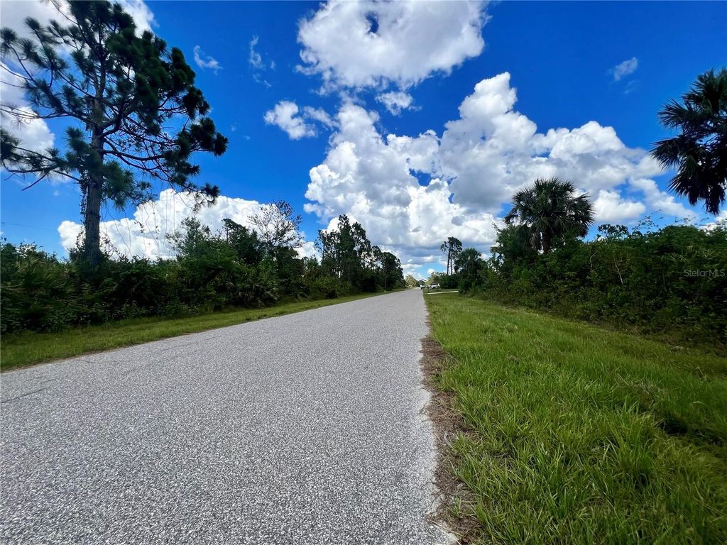 Photo of 12095 Warden Avenue, Port Charlotte, FL 33981 (MLS # C7494935)