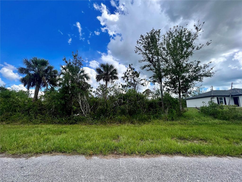 Photo of 12095 Warden Avenue, Port Charlotte, FL 33981 (MLS # C7494935)