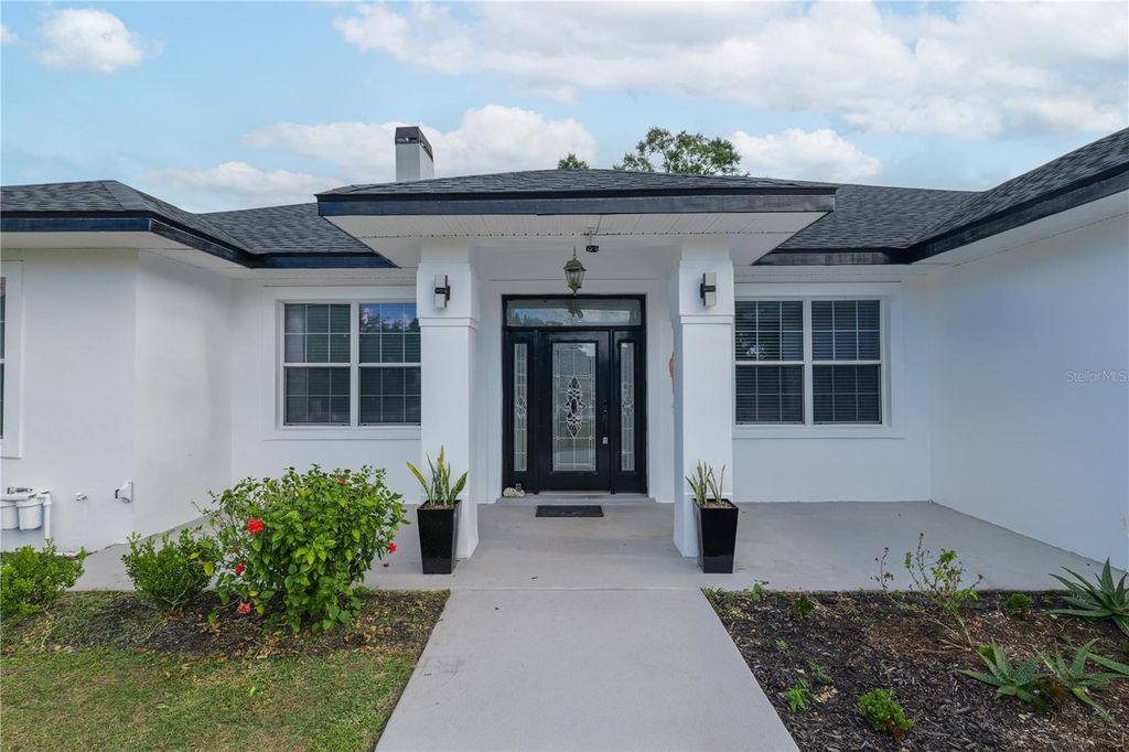 Photo of 8441 Tocoi Path, Lakeland, FL 33810 (MLS # L4957360)