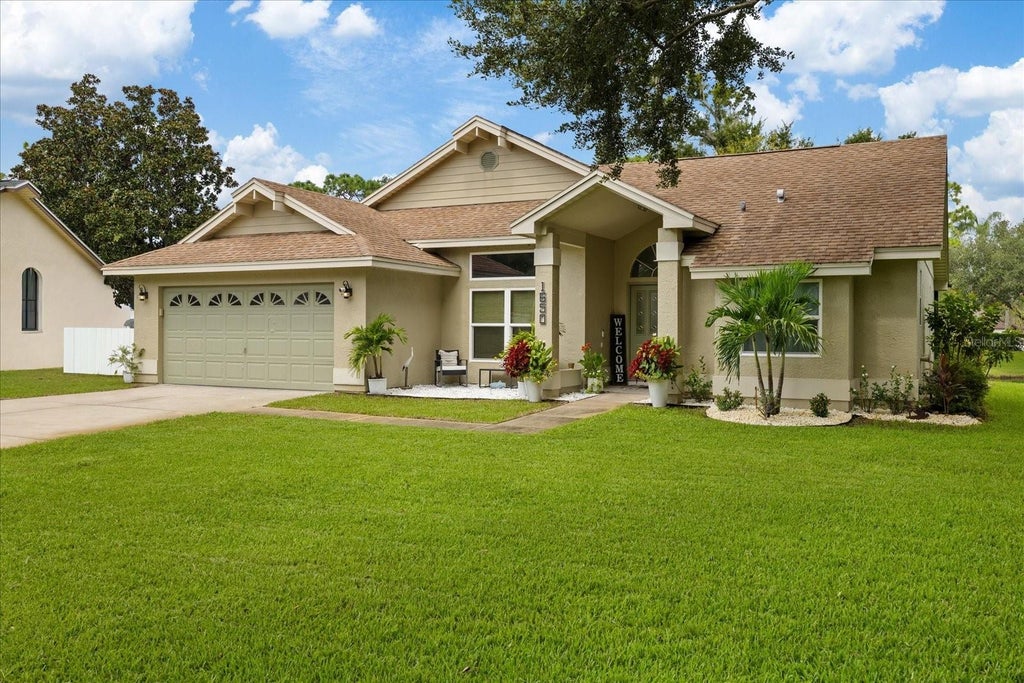 Photo of 1650 Winners Circle, Tarpon Springs, FL 34689 (MLS # TB8544800)