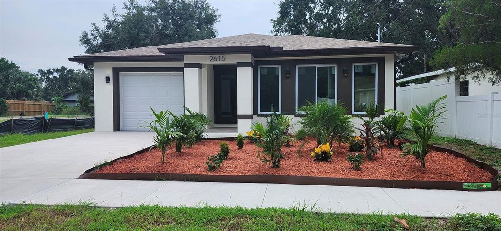 Photo of 2615 E 38th Avenue, Tampa, FL 33610 (MLS # TB8406135)