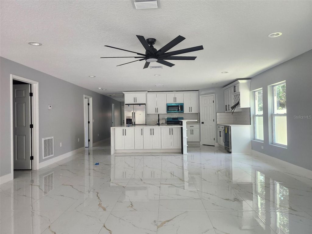 Photo of 2615 E 38th Avenue, Tampa, FL 33610 (MLS # TB8406135)