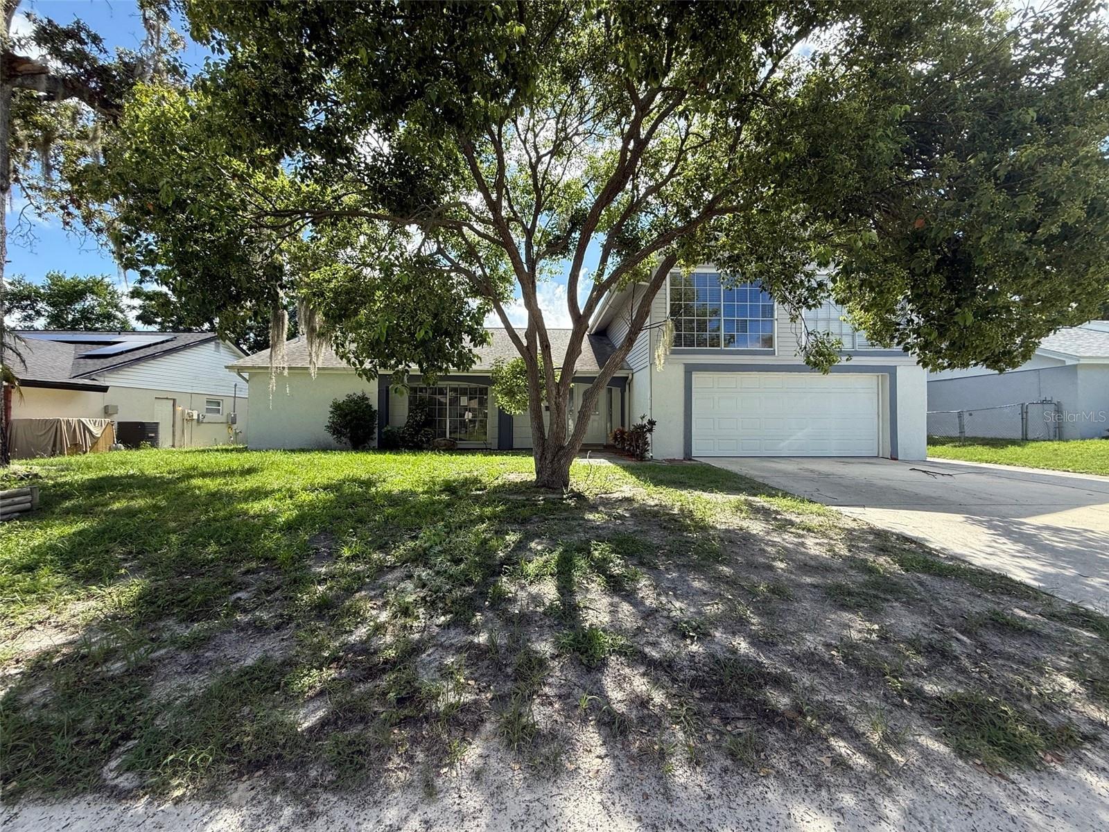 **SELLER FINANCING AVAILABLE WITH QUALIFIED DOWN PAYMENT** Welcome to this spacious 4/3/2 in the well-established Beacon Woods community. This home offers 2047sqft of living space and a flexible layout perfect for everyone. The bedroom layout is also a great option for multi-generational living, with the primary bedroom suite and an additional bedroom/bathroom on the first floor. Two additional large bedrooms with a bathroom are upstairs. Inside, you'll find a large living room, a separate dining area, and a kitchen with plenty of cabinet and counter top space. The home has endless potential to become your dream Florida retreat. Enjoy the screened-in lanai and backyard with mature landscaping - ideal for relaxing or gardening. Beacon Woods is a deed-restricted community with low HOA fees and fantastic amenities, including a clubhouse, community pool, tennis courts, and an 18-hole golf course. Conveniently located just 1 mile from shopping, medical facilities, and restaurants. Public records indicate the property has a repaired sinkhole. Repairs completed in 2015 and documents are available for insurance and peace of mind! Don't miss out!