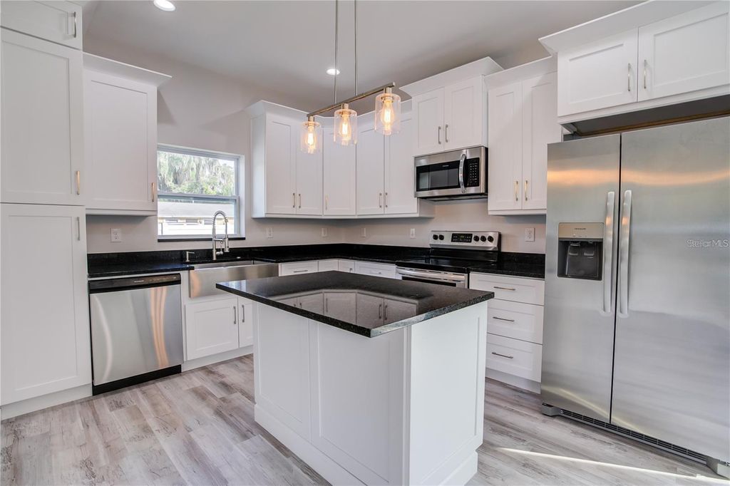 Photo of 5630 Queener Avenue, Port Richey, FL 34668 (MLS # TB8415889)