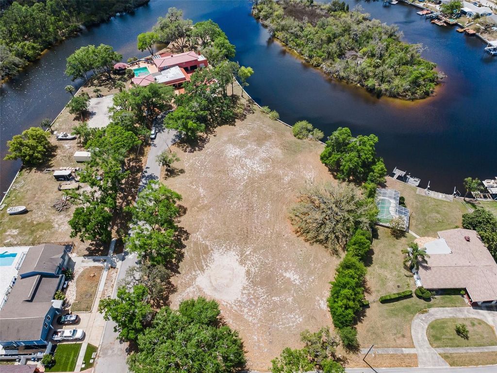 Photo of Flotilla, Holiday, FL 34690 (MLS # TB8498330)