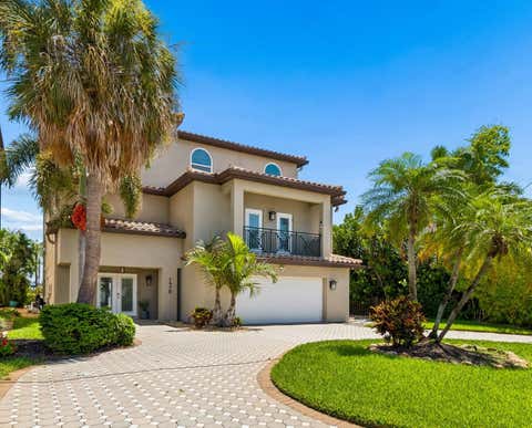 Photo of 136 Devon Drive, Clearwater Beach, FL 33767 (MLS # TB8538531)