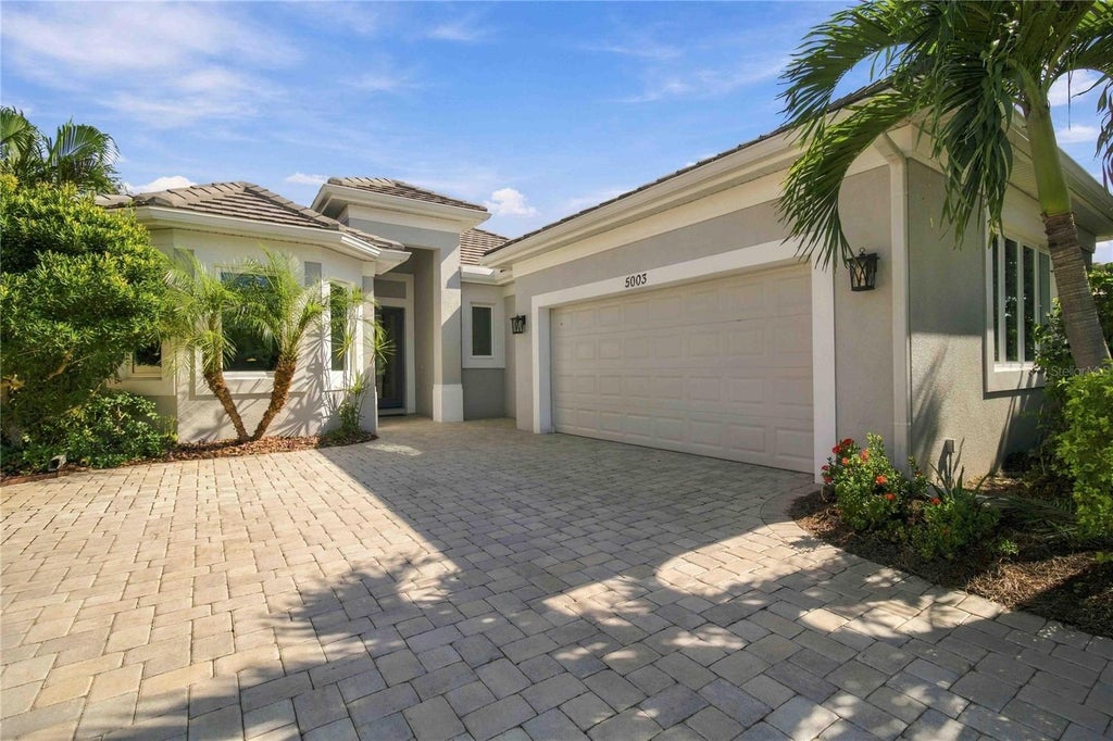 Photo of 5003 Tobermory Way, Bradenton, FL 34211 (MLS # O6450323)