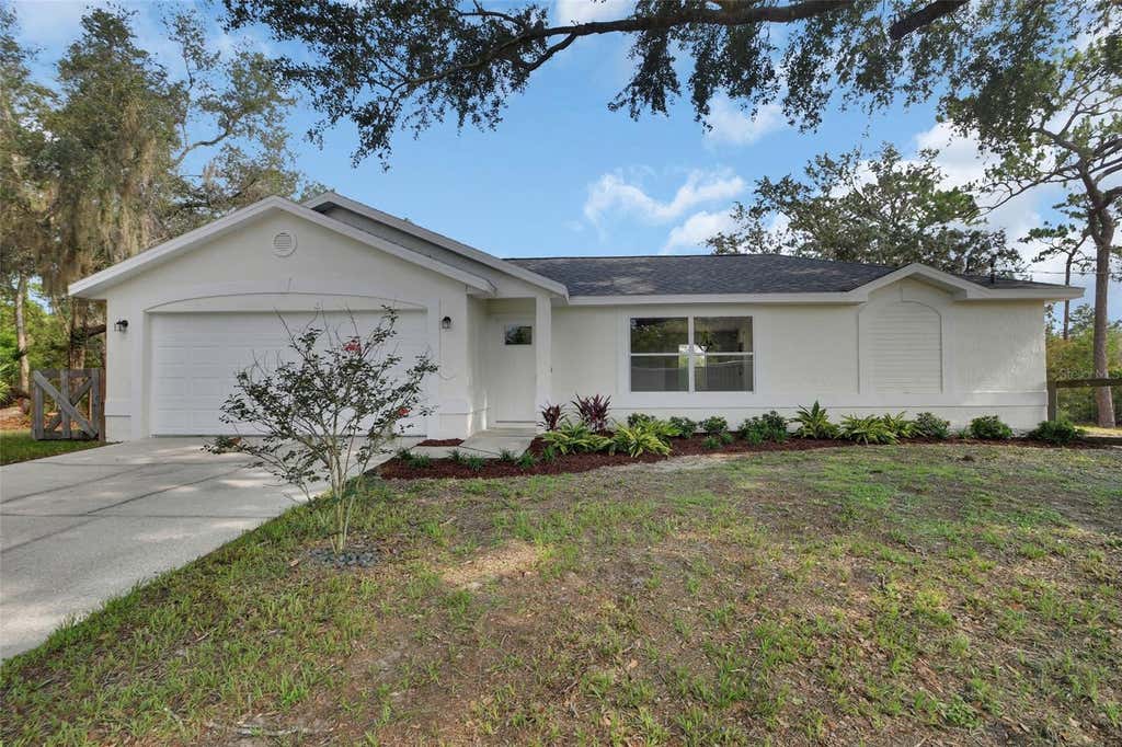 Photo of 1251 Seminole Drive, De Leon Springs, FL 32130 (MLS # V4949968)