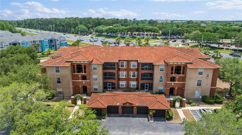 Photo of 5560 Metrowest Boulevard #303, Orlando, FL 32811 (MLS # O6343331)