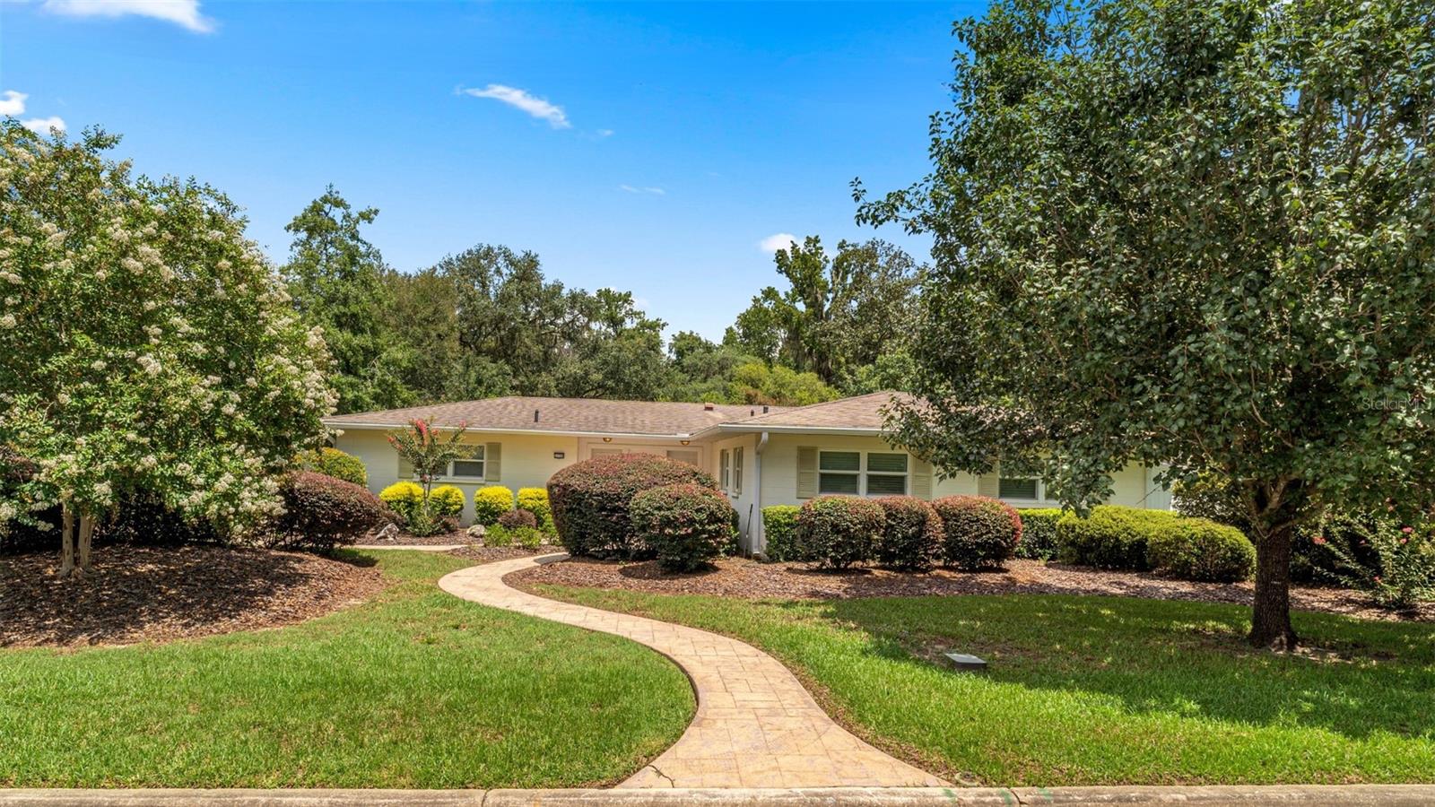 Discover this beautifully maintained 3-bedroom, 2-bathroom home in Orman Leigh Estates located in Northwest Gainesville, offering a perfect blend of comfort, style, and functionality. From the moment you arrive, you’ll notice the pristine landscaping, expansive driveway and two-car garage—ideal for extra vehicles, boats, or toys—with no HOA restrictions holding you back.
Step inside to find a thoughtfully designed interior featuring custom wood cabinetry, granite countertops, and stainless-steel appliances in the kitchen, paired with sleek ceramic tile floors that flow throughout. Custom plantation blinds allow for the perfect natural lighting in every room. The sun-drenched lanai creates the perfect indoor-outdoor living experience, while stamped concrete walkways connect the home’s exterior spaces seamlessly for entertaining or quiet evenings outdoors.
Every detail—from the open kitchen with ample storage to the natural light pouring into every room—has been designed for effortless Florida living. Perfectly located in Orman Leigh Estates, you’ll enjoy proximity to shopping, dining, and highly rated schools, all while tucked away in a private, welcoming neighborhood