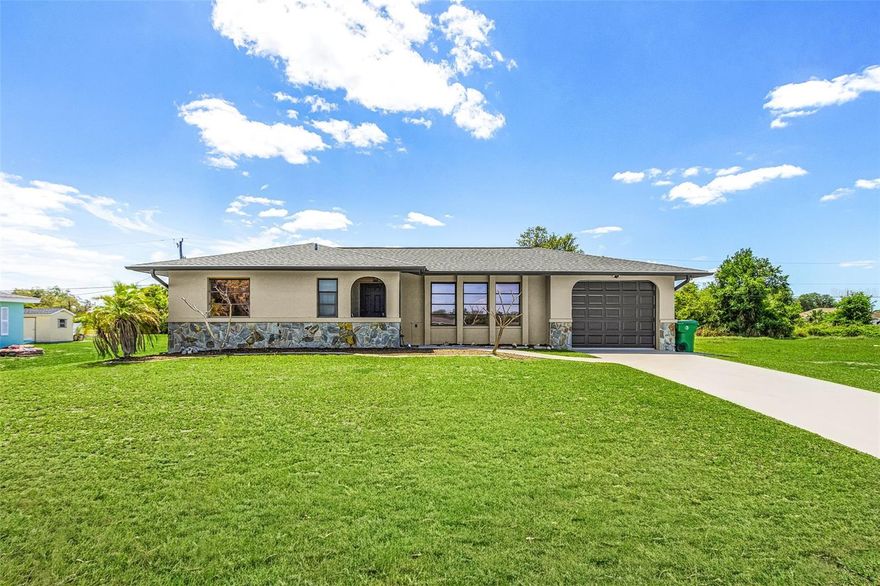 100% Financing Available as this home is located in the APPROVED area for Rural USDA Home Loan that has 100% Financing for qualified buyers!!  Flood Zone X so no flood insurance needed for mortgage!!  MOVE-IN ready home located in a quiet neighborhood approximately 5.6 miles straight shot to I-75 for commuters. This CHARMING 2 bedroom, 2 bath home is perfect for first time homebuyers since costly repairs have already been done!!  Home has a 2022 Asphalt Roof, 2023 AC System, fresh 2026 Exterior Paint, 2023 Septic Tank, all outlets and switches were replaced in 2024, 2026 mini-split AC/dehumidifier in the garage, and has a 10x16 hurricane strapped storage shed in back yard with ramp. The home has a screened front entry with keyless combo door lock system. The spacious living room has tinted sliding doors to the large 22’x11’ screened lanai perfect for entertaining, which includes pocketing sliding pass-through window from kitchen, space for TV, ceiling fan, extra lighting, and patio furniture. Upon entry you will see the beautiful wood plank tiled floors in living room, hall and bedrooms, ceramic tiles in kitchen and bathrooms.  The kitchen has an under-sink Reverse Osmosis with separate water faucet, wood cabinets, tiled counter tops, white appliances, refrigerator, dishwasher, range, microwave and dining area off kitchen. The master suite has a large walk-in closet, master bath has spacious counter space and corner shower. The guest bath has tiled shower/tub combo with accent tile. There is a linen closet in hall between bedrooms. The windows come with blinds or curtains. The garage has a refrigerator, newer washer and dryer, water treatment system with new pressure tank, hurricane rated garage door, man door to exit to side yard, painted floor with shelving racks.  The storm shutters are stored in the locking shed with ramp. The septic tank was pumped in 12/2025.  The septic tank was replaced because of tree root intrusion from a tree that was removed when new septic tank was installed.  The home is in a convenient location only about 4 miles from grocery shopping.  Two videos tours available, walk-through and 3D Interactive Tours.  Schedule your showing today!!!