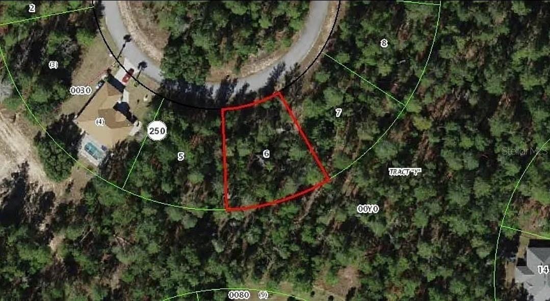 Build your dream home on this beautiful cul-de-sac lot located in the highly desirable community of Sugarmill Woods Oak Village. This peaceful Nature Coast neighborhood is known for its unique design, where every property backs up to green space, offering natural privacy and serene surroundings. An added bonus: the lot next door is also available, providing a rare opportunity to expand or create a multi-lot estate. (ATTN BUILDERS). There is no required timeframe to build, and the community offers a low annual HOA fee. Residents have the option to join the Sugarmill Woods Country Club, which features two golf courses, tennis and pickleball courts, a swimming pool, tiki bar, and a full-service restaurant. Conveniently located with easy access to the Suncoast Parkway, this property offers a quick commute to Tampa, the airport, and the greater Tampa Bay area. This is a perfect setting to create your forever home in a tranquil, nature-filled environment.