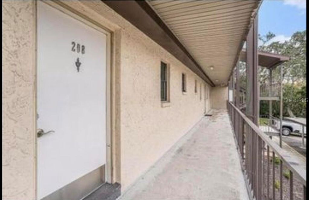 Photo of 5245 Amulet Drive #208, New Port Richey, FL 34652 (MLS # O6370004)