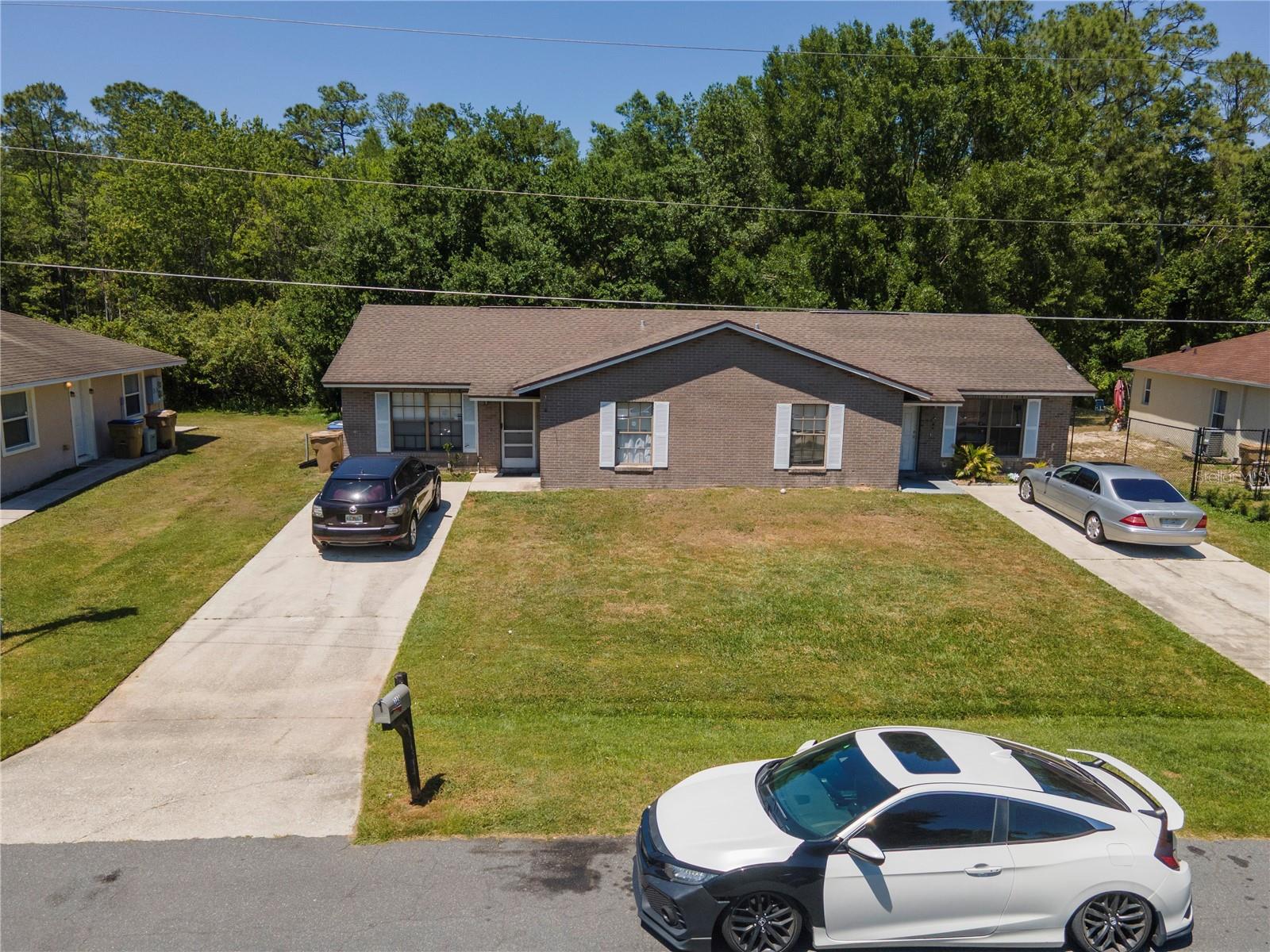 SELLER MOTIVATED!!!!Welcome to 349-351 Caldbeck Way, Kissimmee, FL 34758 — a full duplex offering nearly 2,000 sq ft of heated living space. Each side features 2 bedrooms, 2 bathrooms, a screened-in porch, and no rear neighbors with the Kissimmee River running behind the property deemed conservation land, providing extra privacy for tenants. Both A/C units were replaced just 3 years ago.
The 351 Caldbeck side was fully renovated in 2019 and was approved by Osceola County Section 8 in 2024, offering guaranteed rental income. Both units are currently leased, making this a true turnkey investment.
Located in a residential community with convenient access to local schools, parks, and daily amenities. Whether you're expanding your rental portfolio or seeking a multi-family opportunity, this property delivers immediate cash flow and long-term potential.
Schedule your showing today!