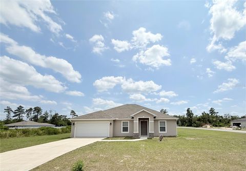 Photo of 15712 SW 37th Circle, Ocala, FL 34473 (MLS # OM724443)