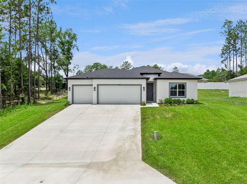 Photo of 7073 SW 131st Loop, Ocala, FL 34473 (MLS # O6417000)