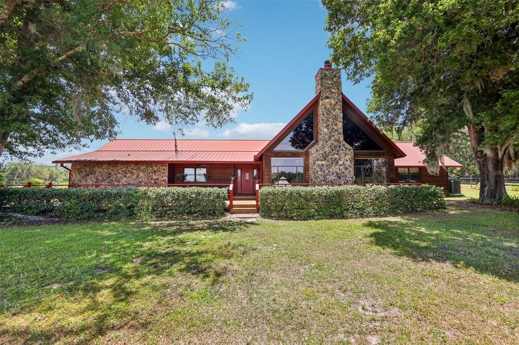 Photo of 35841 Timbertop Lane, Fruitland Park, FL 34731 (MLS # OM724310)