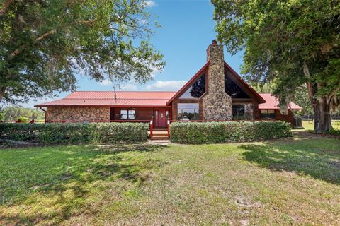 Photo of 35841 Timbertop Lane, Fruitland Park, FL 34731 (MLS # OM724310)