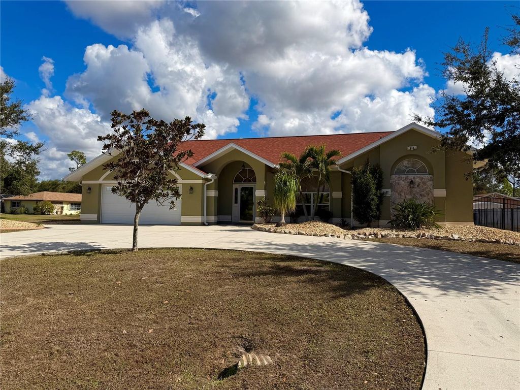 Photo of 1186 Sandy Street, Port Charlotte, FL 33952 (MLS # C7523029)