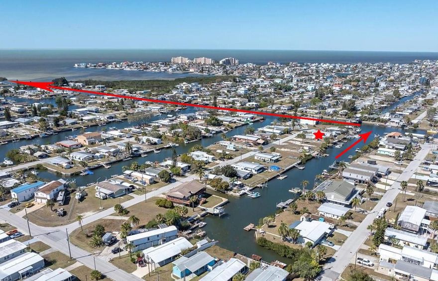 Direct Gulf access! This waterfront homesite offers 40 feet of frontage on a saltwater canal, complete with a $20,000 concrete seawall installed in 2023, property also has a floating dock. Enjoy quick access to the Gulf of America with no fixed bridges, making it ideal for boating, fishing, and the ultimate Florida waterfront lifestyle.  Located in the Signal Cove community, residents have the option to join the Civic Association, which offers a clubhouse and access to a private boat ramp. The optional fee is just $65 per year, plus an additional $40 annually for boat ramp access. Conveniently situated near major highways, medical facilities, shopping, and Gulf beaches, this property offers both accessibility and a true coastal setting. Value is in the land. The existing mobile home is uninhabitable due to substantial hurricane damage and will require demolition. CASH only.