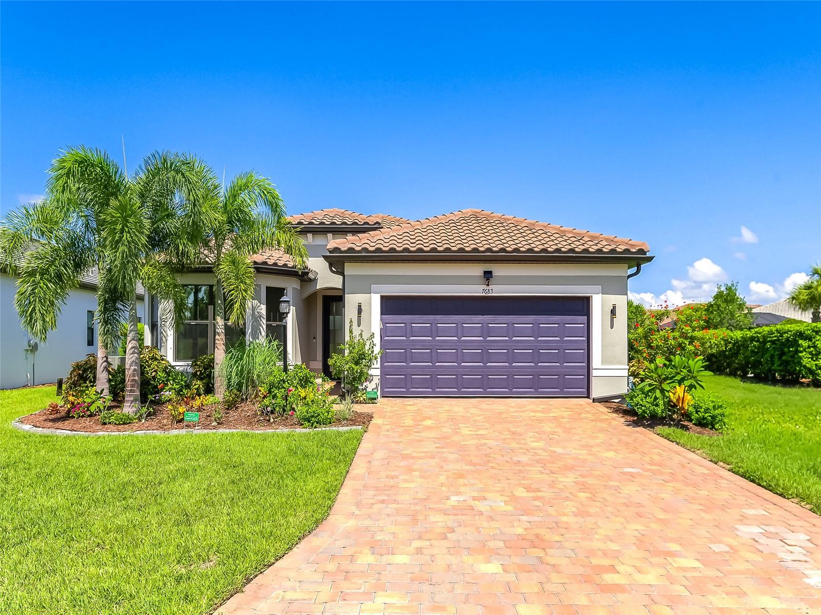 Indulge yourself - Live like you are on Vacation...Every Day! A Dynamic Lifestyle awaits you at Del Webb Lakewood Ranch, a Gated, 55+ Resort Community! The consummate experience in Active, Luxury Living! Located on an Ideal Lot w/ unique Full Lake View, Privacy & Easy Access via the Rear Community Gate. Better than New! Move-In Ready w/ a Myriad of Custom Upgrades. Built in 2023, this extraordinary home offers a blend of Coastal Casual Style & Modern Sophistication. The stunning & sunlit Great Room w/ Tray Ceiling features Zero-Corner Pocketing Sliding Doors, opening to an expansive Lanai w/ tranquil Lake Views. Lanai is an ideal spot for relaxing, dining or watching dramatic evening Sunsets over the Lake. Versatile Lanai offers Upgraded Ceiling Fans, Recessed Lights, TV hook-up & pre-plum for Outdoor Kitchen. Prepare meals & gather in a modern Chef’s Kitchen featuring a Large Island w/ Farm Sink, Breakfast Bar, Quartz Countertops & Walk-In Pantry. Stainless Steel Appliances (under warranty) include upgraded LG Refrigerator, Microwave, Triple-Layer Dishwasher, Gas Stove that doubles as an Air Fryer. At the end of an active day, the Primary Suite is a relaxing Retreat!! Perfect spot for refreshing & rejuvenating! Entering, you are greeted by a panoramic View of the Lake through x-Large Windows. The Spa-Like En-Suite Bathroom features a Large, Walk-In Shower w/ Floor-to-Ceiling Tile, Double Sinks, Quartz Countertops, Linen Closet & private Water Closet. The colossal Custom Walk-In Closet offers abundant space for clothes & storage. The convenient Flex Room space can be used as a Den/Office or additional bedroom, to suit your needs. Separated for Privacy, the 2nd Bedroom features a charming Bay Window. Only steps to an adjacent 2nd Bathroom w/ Quartz Countertop, Custom Linen Closet, Tub/Shower combination, floor-to-ceiling tile & raised shower head for a “true rain head experience”. The private 3rd Bedroom is nearby, tucked away from main living areas. A large hallway closet is perfect for beach & pool supplies. Sizable Laundry Room offers abundant Cabinets, Counters, Farm Sink w/ custom spray nozzle & Spacious Storage Closet. Discover a convenient Drop Zone at Garage entrance. An Oversized 2-Car Garage features 4’ extension, Epoxy Floor, EV Charger & Overhead Shelving. You will appreciate the long list of Special Features & Details throughout the home. Enjoy Customized Flooring, w/ Luxury Vinyl Planks, Custom Closets w/ Wood Shelving, Marble Window Sills, Designer Lighting, Custom Paint & Window Treatments, 8’ Doors, 5” Baseboards & a whole-house Water Filtration System. Enjoy Energy efficiency w/ Gas Hot Water Heater & UV Tinted Windows/Doors. Hurricane Shutters are available for windows & doors. The Gated & Maintenance-Free Del Webb community offers an extraordinary lifestyle, filled w/ a daily calendar of events, sports & social activities coordinated by a Lifestyle Director. The 28,000sf Clubhouse features a state-of-the-art Fitness Center, Billiards Room, Card Room, Game Room, Library & Party Spaces. Swim in the resort-style Pool or choose to participate in Tennis, Pickle Ball, Bocce or Group Fitness Classes. Relax at the onsite Restaurant/Bar. A prime location just minutes from restaurants, golf courses & shopping. Lakewood Ranch is the #1 Selling Planned Community in the U.S. Close to I-75 & world-class beaches. Welcome to your perfect home in Paradise!