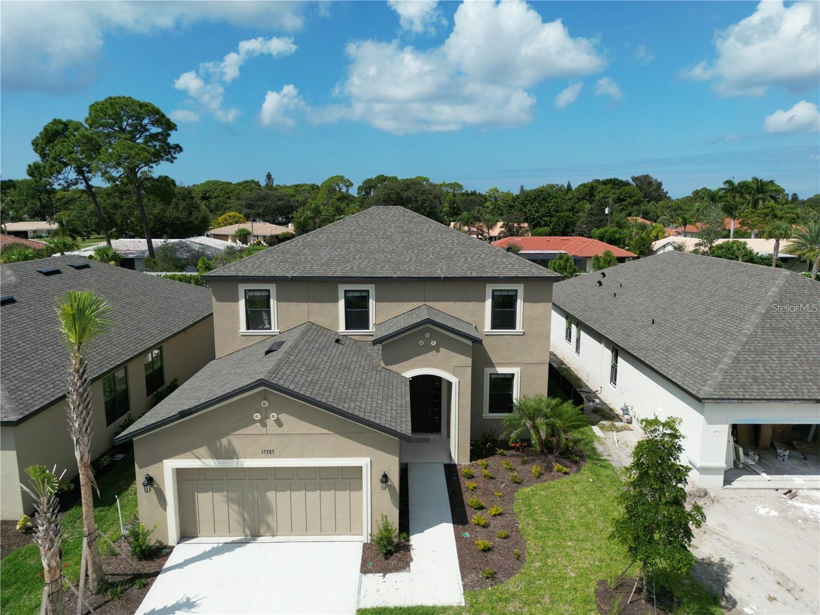 Welcome to your stunning single-family home in the heart of Sarasota’s most sought-after area. This beautiful residence offers 4 bedrooms, a den/office, and 3.5 bathrooms, with no front or back neighbors, ensuring your peace and privacy on your porch or in the backyard. The kitchen features sleek light color cabinets with pull-out shelving, elegant quartz countertops, a spacious center island, a pantry, and stainless steel appliances. The first-floor Master Suite includes an ensuite bathroom with dual vanities, a relaxing garden tub, and a separate shower. Also on the main level, you’ll find a formal dining/office space with pond views, a convenient half bath, and a laundry room. Upstairs, enjoy a generous loft area, a large study/den, three additional bedrooms, and two full bathrooms. Located in the newer gated community of Palmero, you’re just minutes from Pine View School—ranked the best public school in Florida—and only a short drive to Nokomis Beach and Oscar Scherer State Park, perfect for outdoor adventures. You’ll also be close to Sarasota Memorial Hospital-Venice, top-rated for healthcare, along with supermarkets, dining, and more. This home features Taylor Morrison’s LiveWell technologies, including advanced air filtration, smart thermostat capabilities, a hands-free kitchen faucet, water filtration, and low-VOC paint. The community offers a beach valley, playground, splash pad, pet park, and a pool with a cabana. Enjoy easy access to I-75 and US-41 while avoiding heavy traffic, perfectly situated between Venice and vibrant Sarasota.