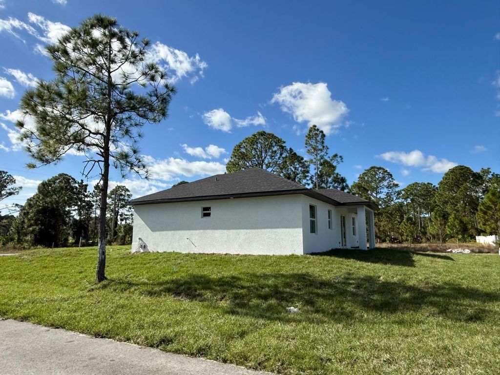 Photo of 1121 Florence Street E, Lehigh Acres, FL 33974 (MLS # S5142602)