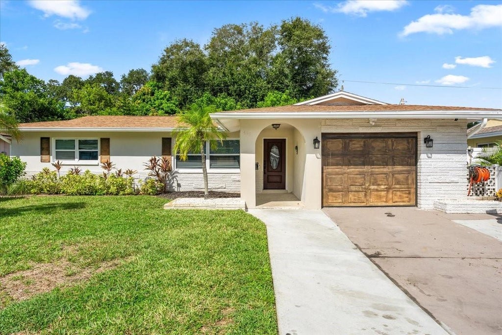 Photo of 490 E Lake Drive, Largo, FL 33771 (MLS # TB8546131)