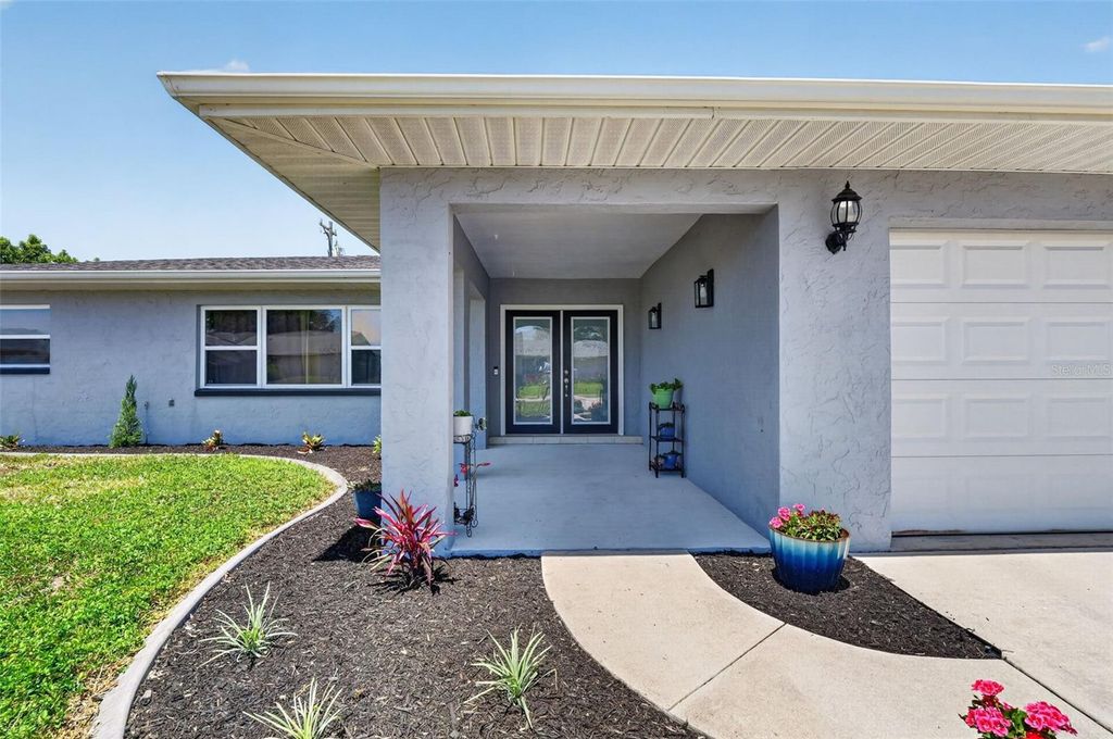 Photo of 1305 SE 37th Terrace, Cape Coral, FL 33904 (MLS # C7525433)