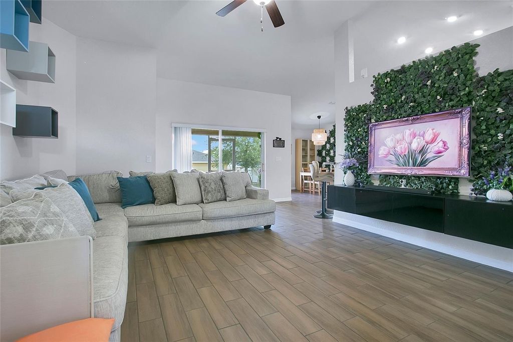 Photo of 2021 Horse Creek Lane, Haines City, FL 33844 (MLS # O6400578)