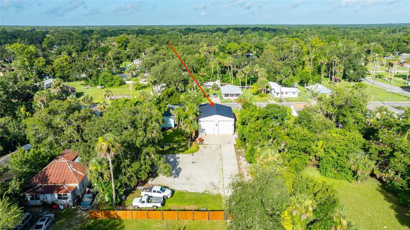 A TRULY ONE OF A KIND PROPERTY. Street to Street Two Lots 50 x 120 and 100 x 120. Two Addresses. Gated, with a Commercial Grade 2022 Built 35 x 40 Square FT Garage W / Loft & Bathroom, Suitable for Large Boats, RV's, just about any type of business or purpose. Oversized Doors, RV Hook-ups, Etc, and only two turns to the North Causeway Public Boat Launch. Concrete Block Home attached to the back side of the Garage, perfect as an Income Producing Rental. The Front Side of the property is zoned for a Large Home or Duplex to be built. Impact and Utilities Paid For. Endless Possibilities for Storage, Producing Income, and More. Call Today for an Appointment. (Addresses are 334 Sheldon and 345 N Myrtle).