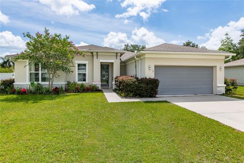 Photo of 19 Russman Lane, Palm Coast, FL 32164 (MLS # FC307911) Photo of 19 Russman Lane, Palm Coast, FL 32164 (MLS # FC307911)